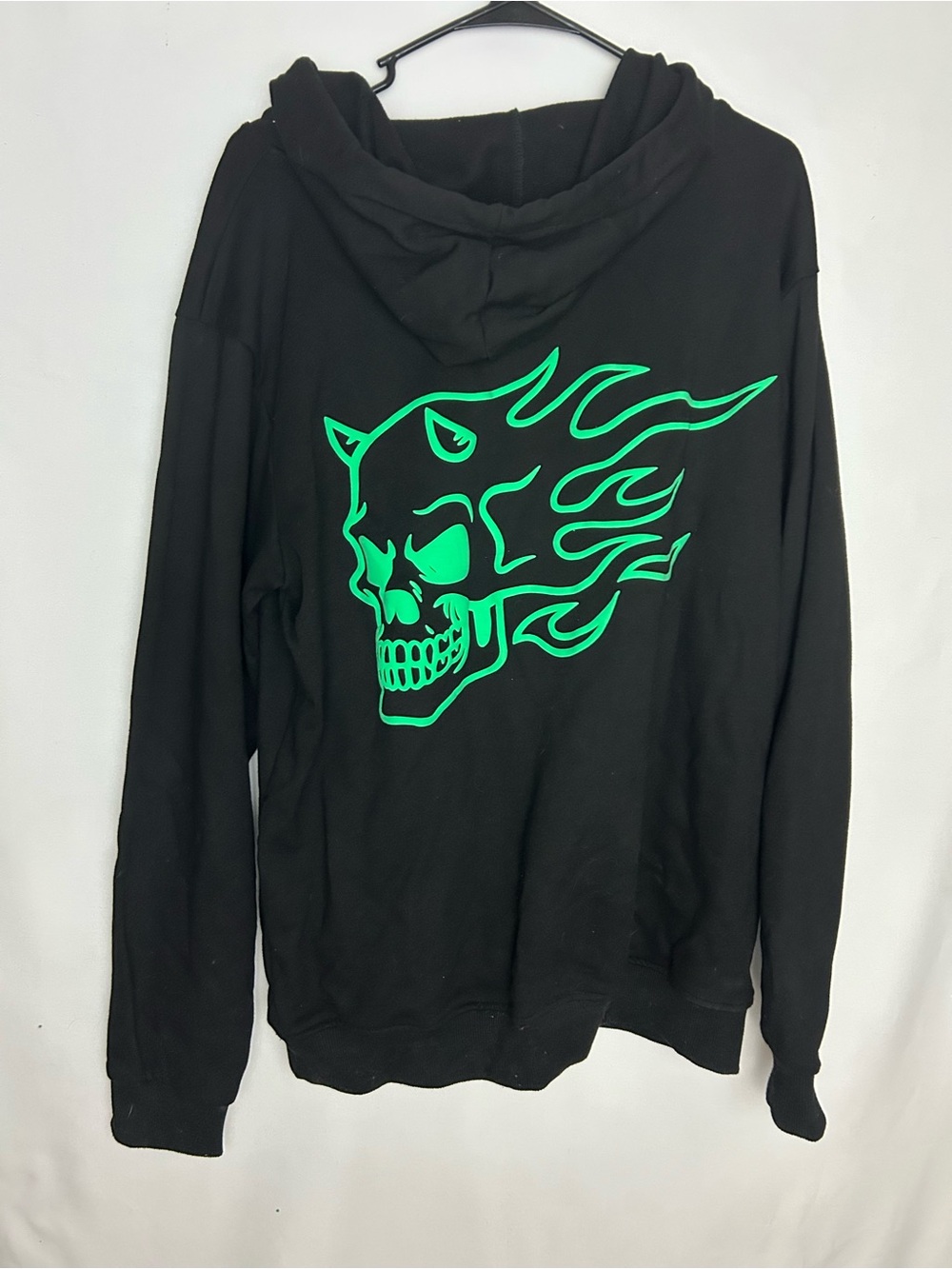 Black Hoodie with Neon Green Flaming Skull Graphic